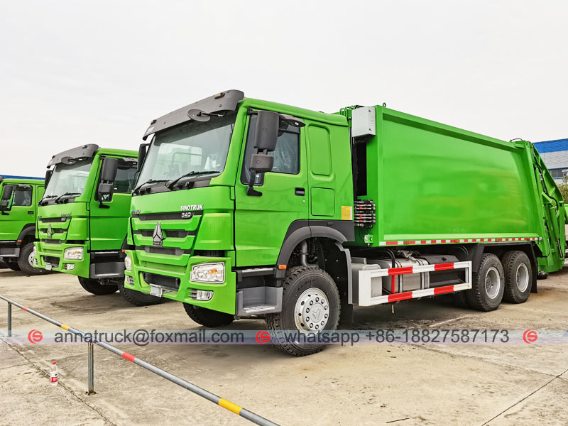 A Tanzania 4 unidades de camiones de basura compactadores SINOTRUK HOWO
        