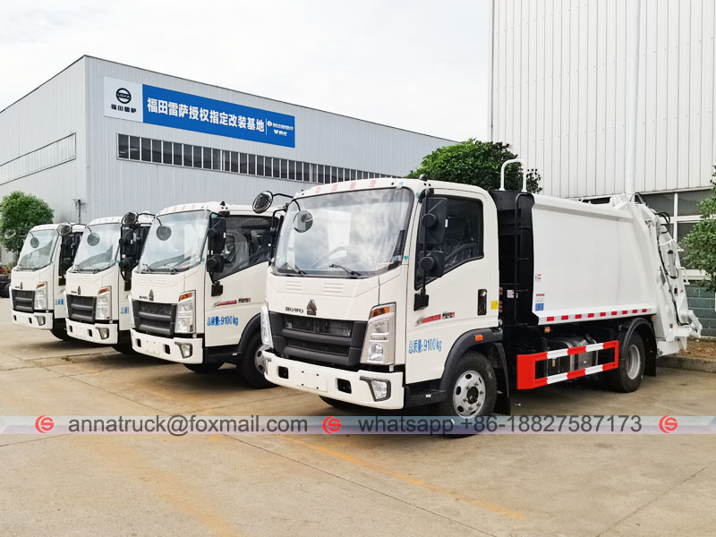 Camión de basura compactador SINOTRUK HOWO de 4 unidades a Asia
